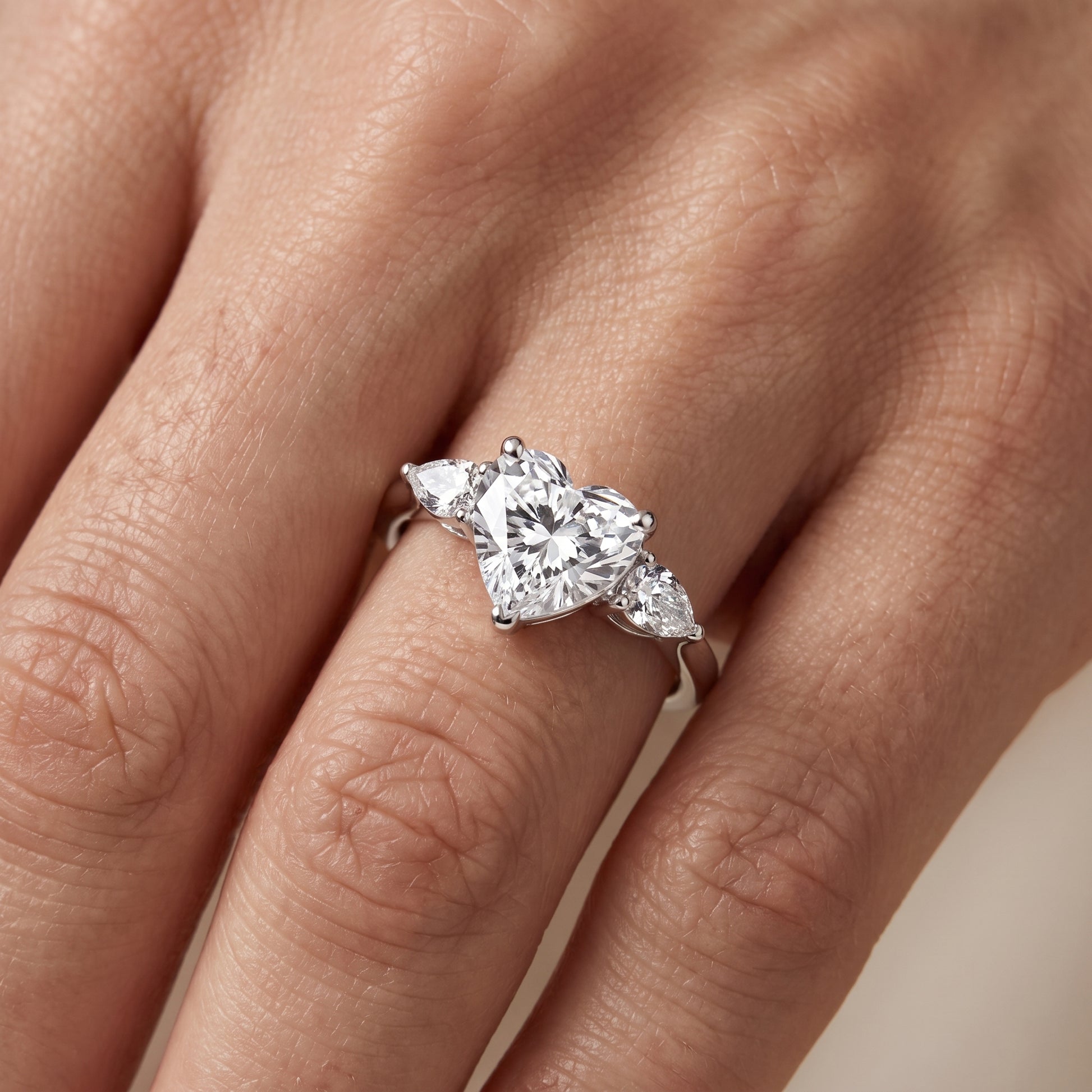 Faye Three-Stone Trellis Heart Diamond Ring in Platinum - lifestyle.jpg