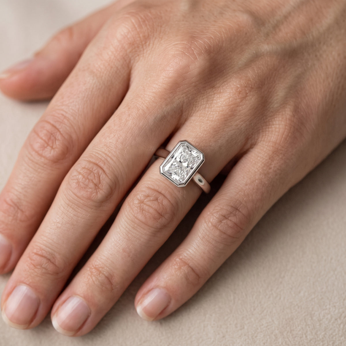 Jolie Bezel Solitaire Radiant Diamond Engagement Ring in White Gold - lifestyle.jpg