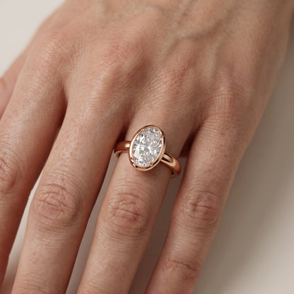 Alina Bezel Solitaire Oval Diamond Ring in Rose Gold - lifestyle.jpg