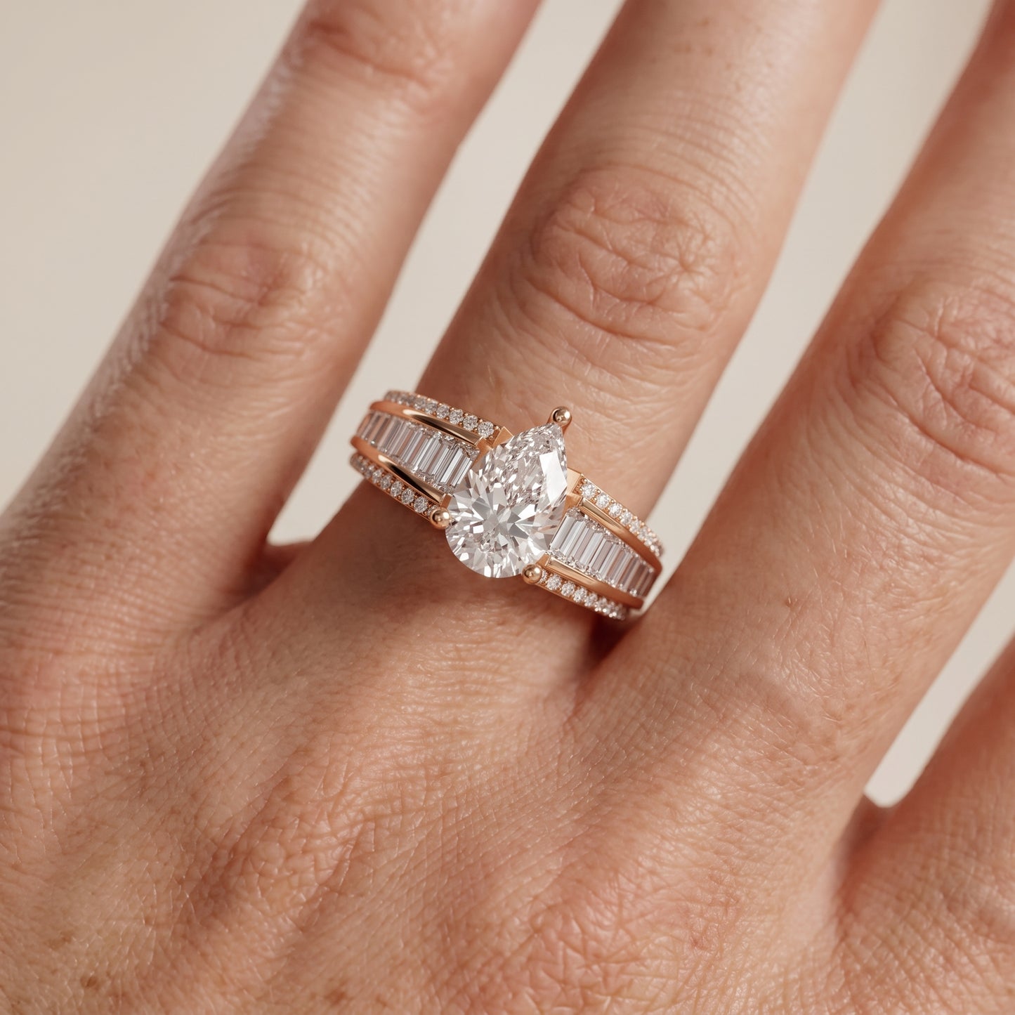 Halle Channel Set Baguette Accent Pear Diamond Engagement Ring in Rose Gold - lifestyle.jpg