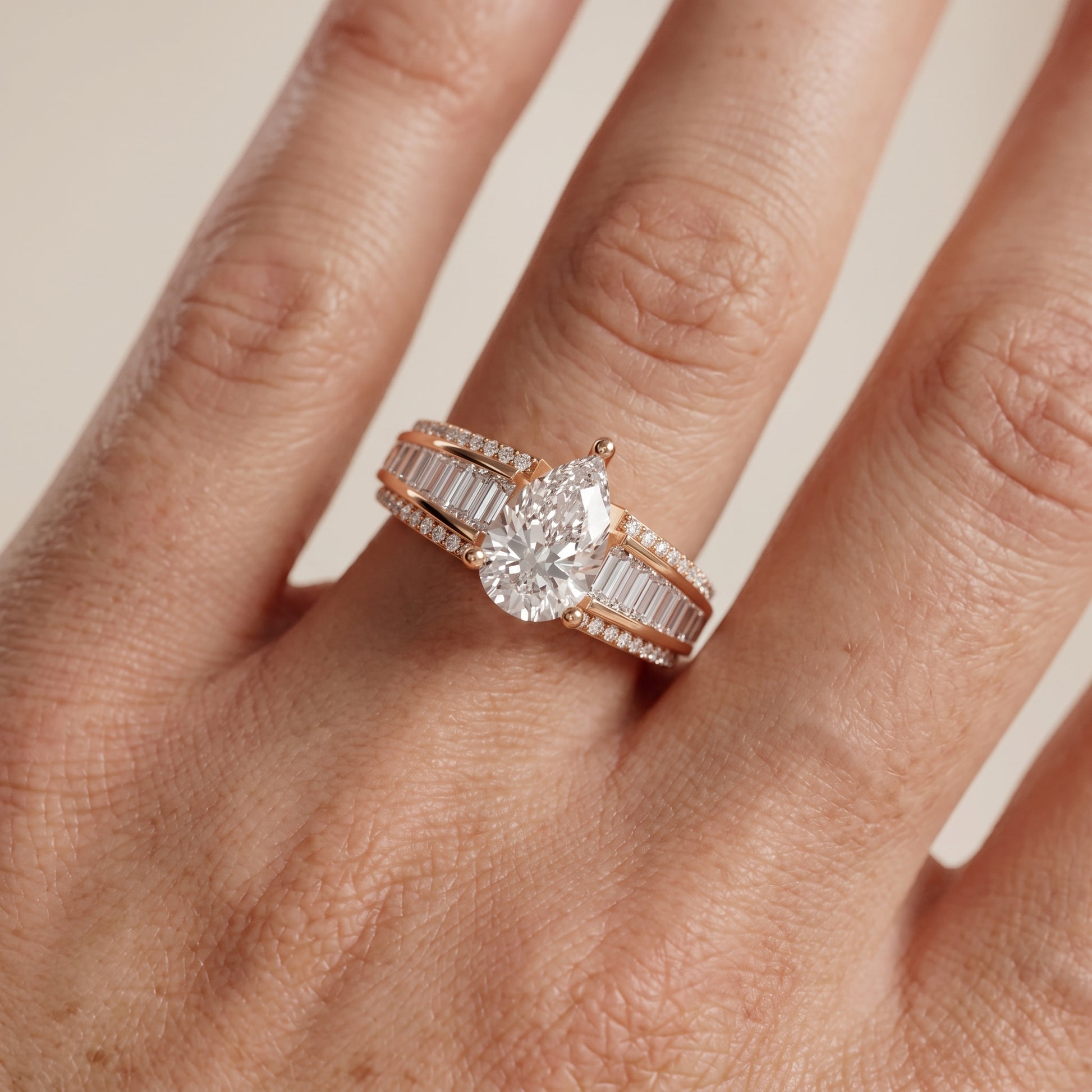 Halle Channel Set Baguette Accent Pear Diamond Engagement Ring in Rose Gold - lifestyle.jpg