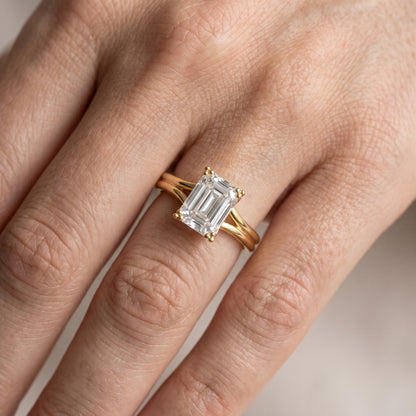 Neve Solitaire Split Shank Emerald Diamond Engagement Ring in Silver - lifestyle.jpg