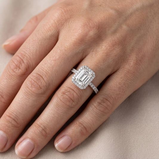 Mabel Halo French Pavé Emerald Diamond Engagement Ring in Platinum - lifestyle.jpg