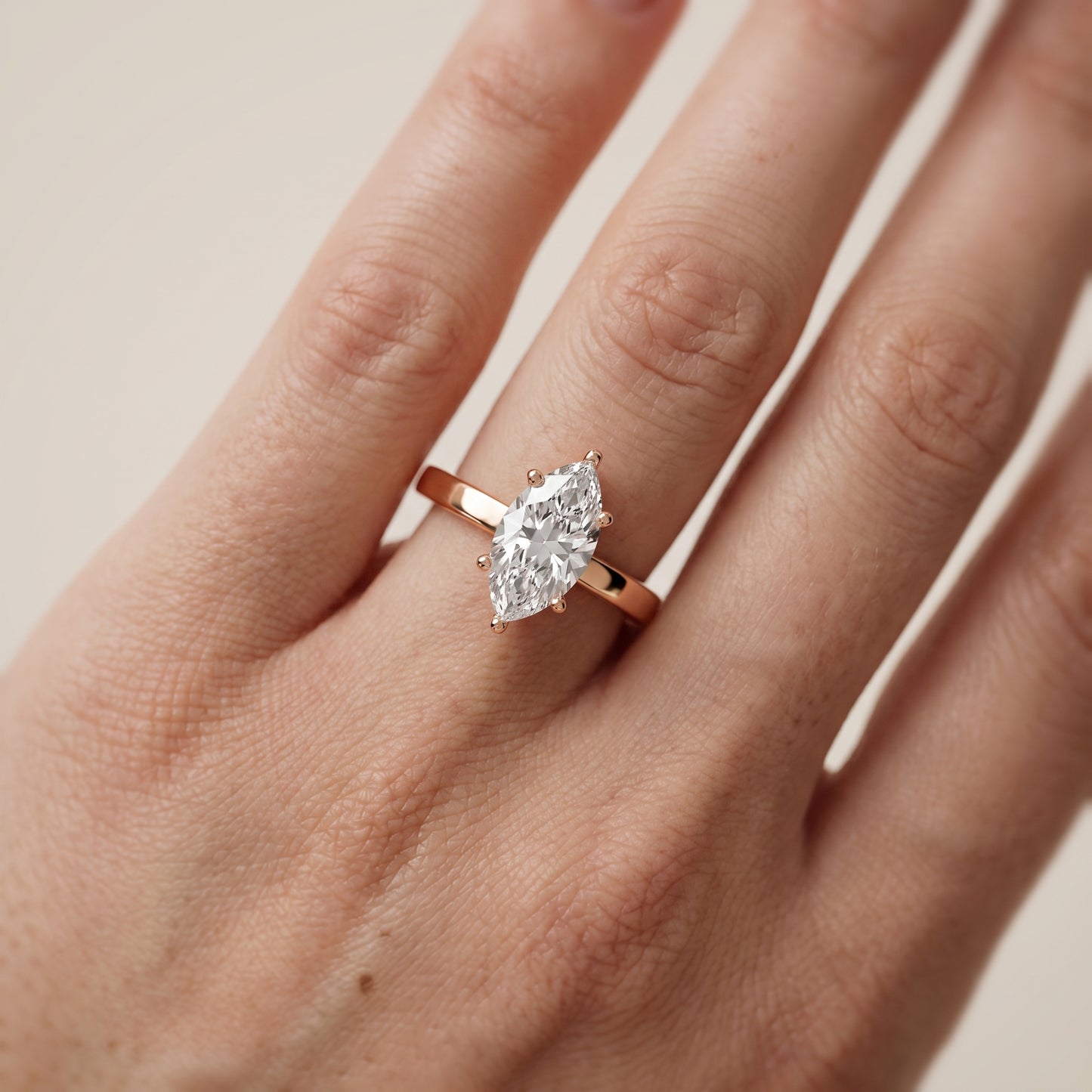 Delia Solitaire Marquise Diamond Engagement Ring in Rose Gold - lifestyle.jpg