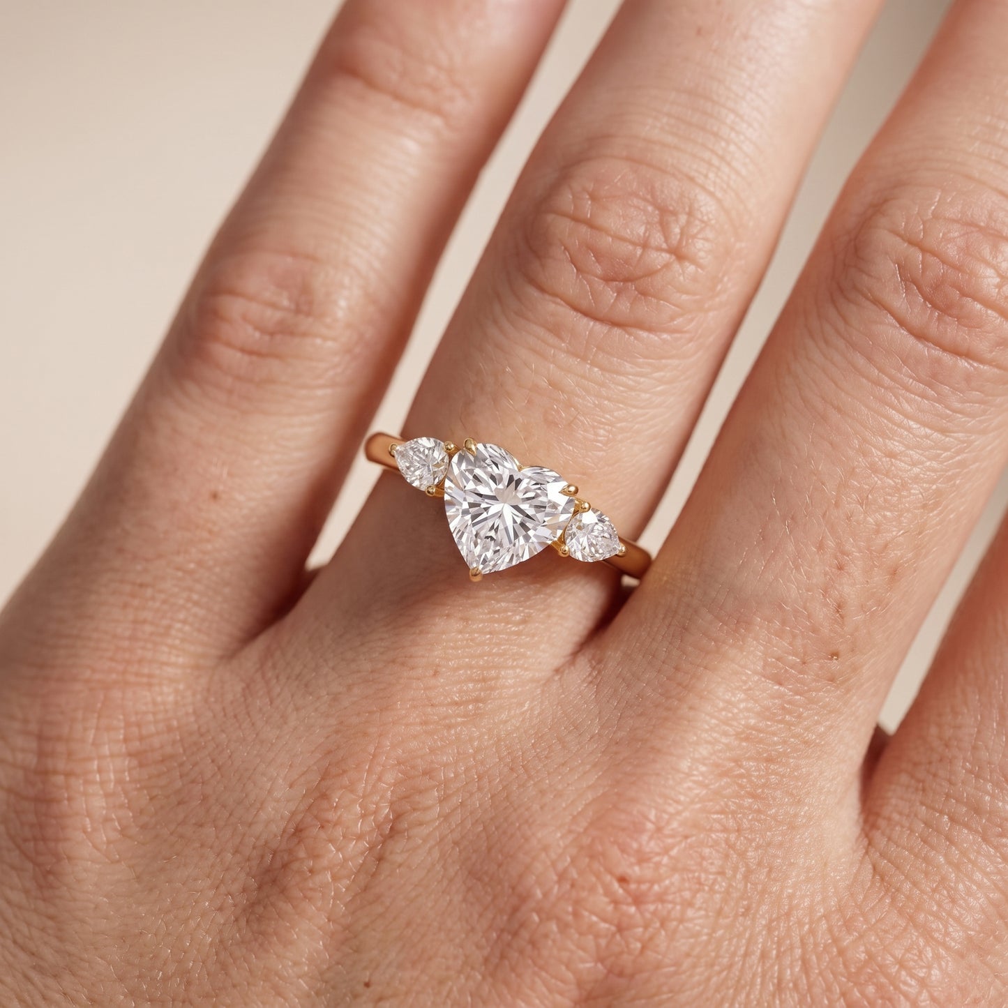 Phoebe Three-Stone Heart Diamond Ring in Yellow Gold - lifestyle.jpg