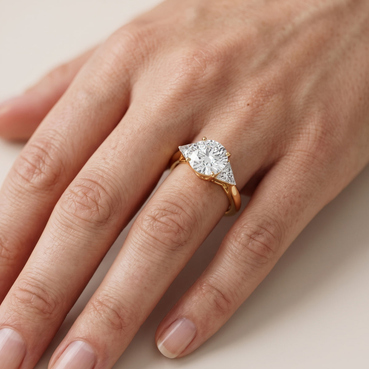 Camilla Three-Stone Cathedral Round Diamond Engagement Ring in White Gold - lifestyle.jpg