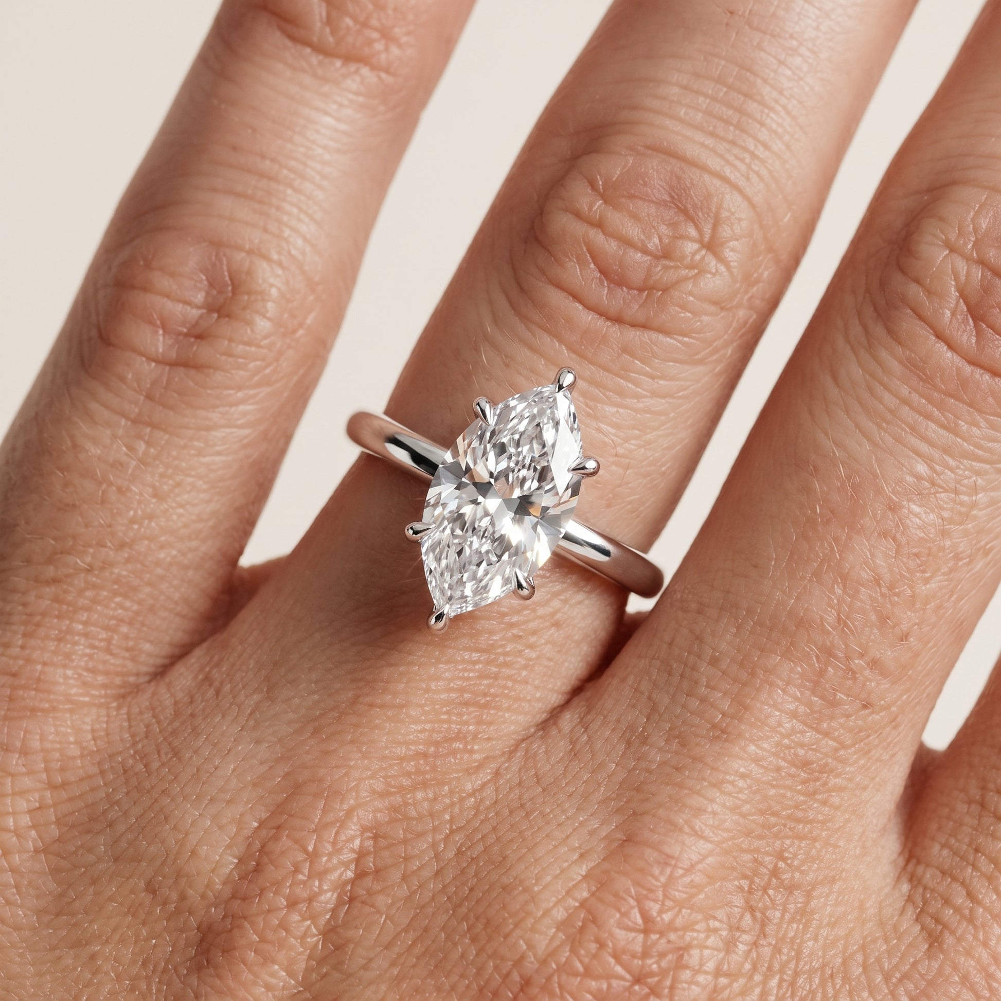 Lyla Petite Solitaire Marquise Diamond Engagement Ring in Platinum - lifestyle.jpg
