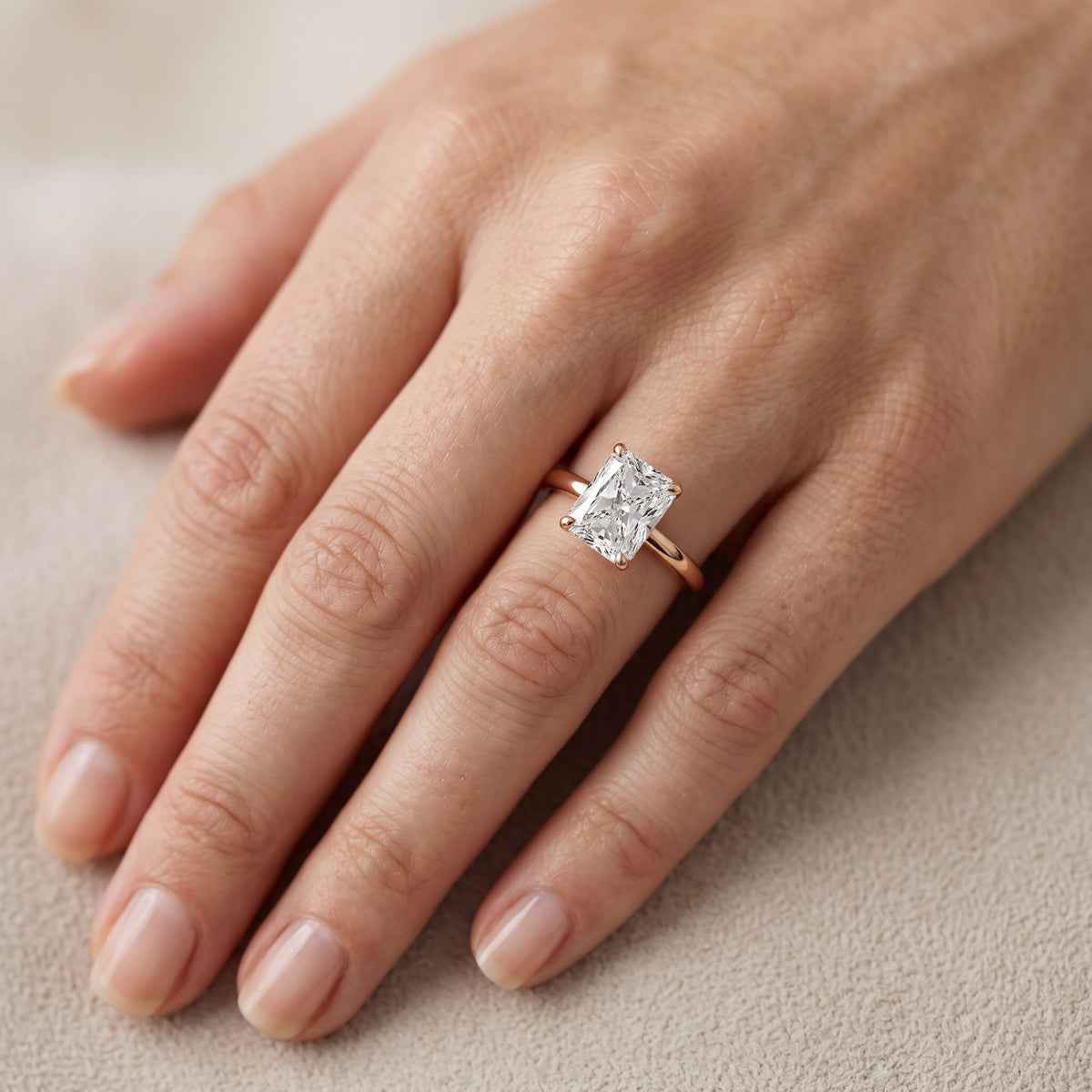 Charlotte Charm Solitaire Radiant Diamond Engagement Ring in Rose Gold - lifestyle.jpg