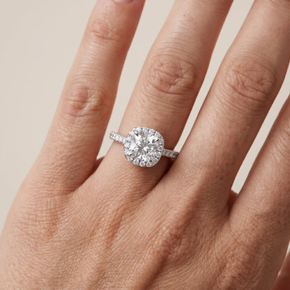 Amara Halo Claw Prong Cushion Diamond Ring in Platinum - lifestyle.jpg