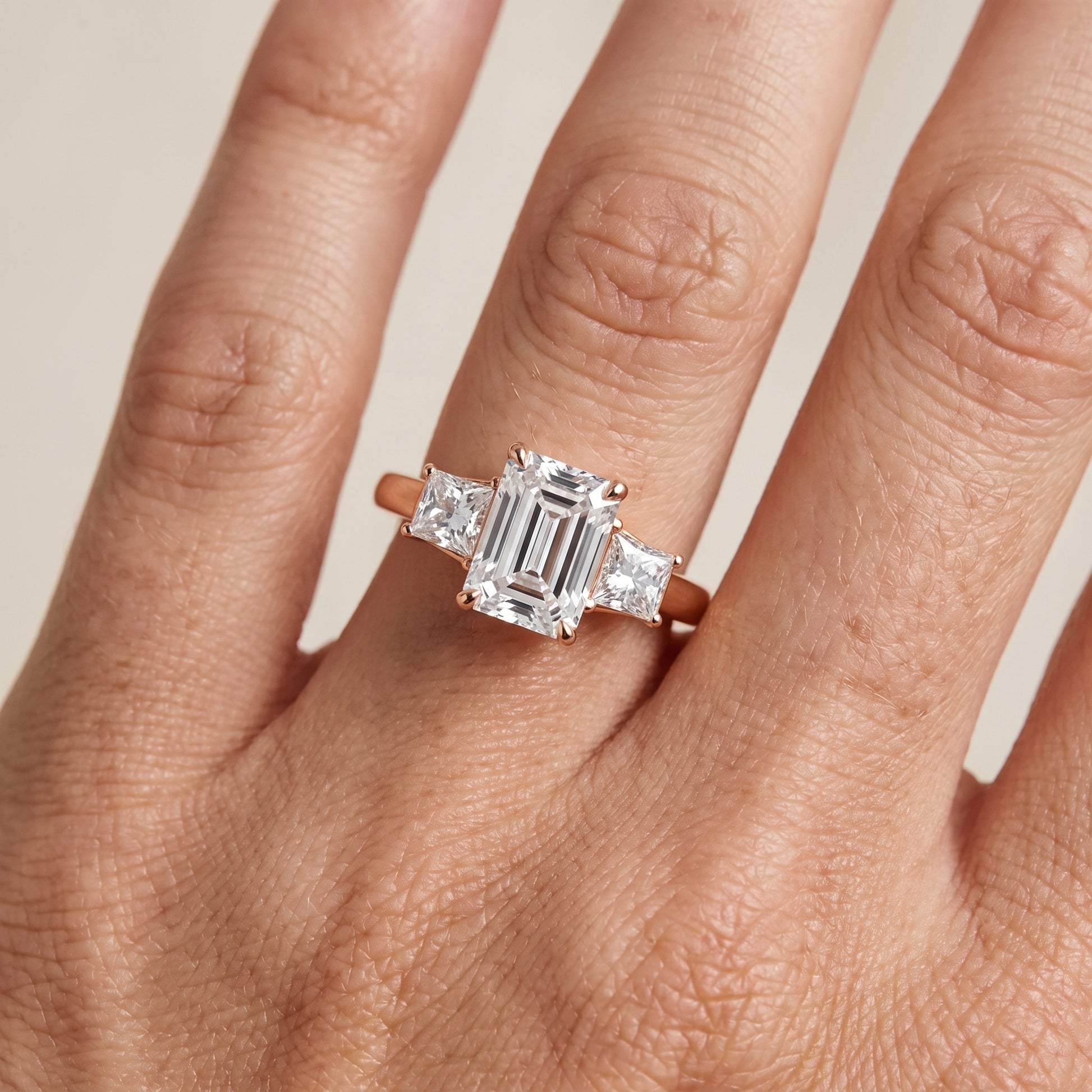 Selena Three-Stone Basket Emerald Diamond Ring in Rose Gold - lifestyle.jpg