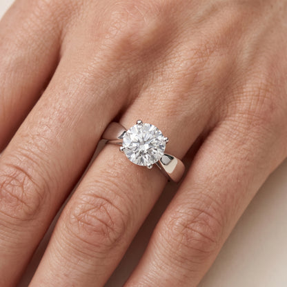 Talia Solitaire Twist Round Diamond Engagement Ring in Silver - lifestyle.jpg