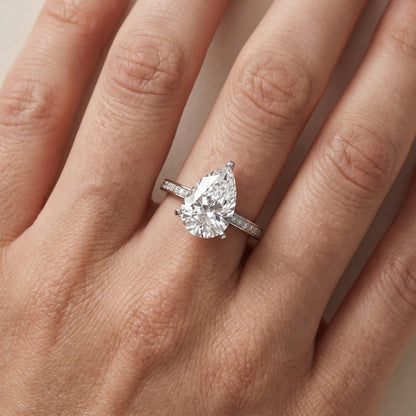 Naia Hidden Halo Pear Diamond Ring in White Gold - lifestyle.jpg