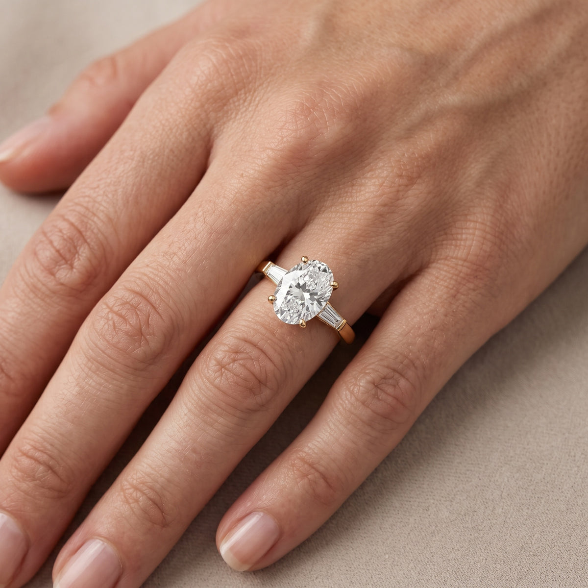 Jacinta Baguette Three-Stone Oval Diamond Engagement Ring in Silver - lifestyle.jpg