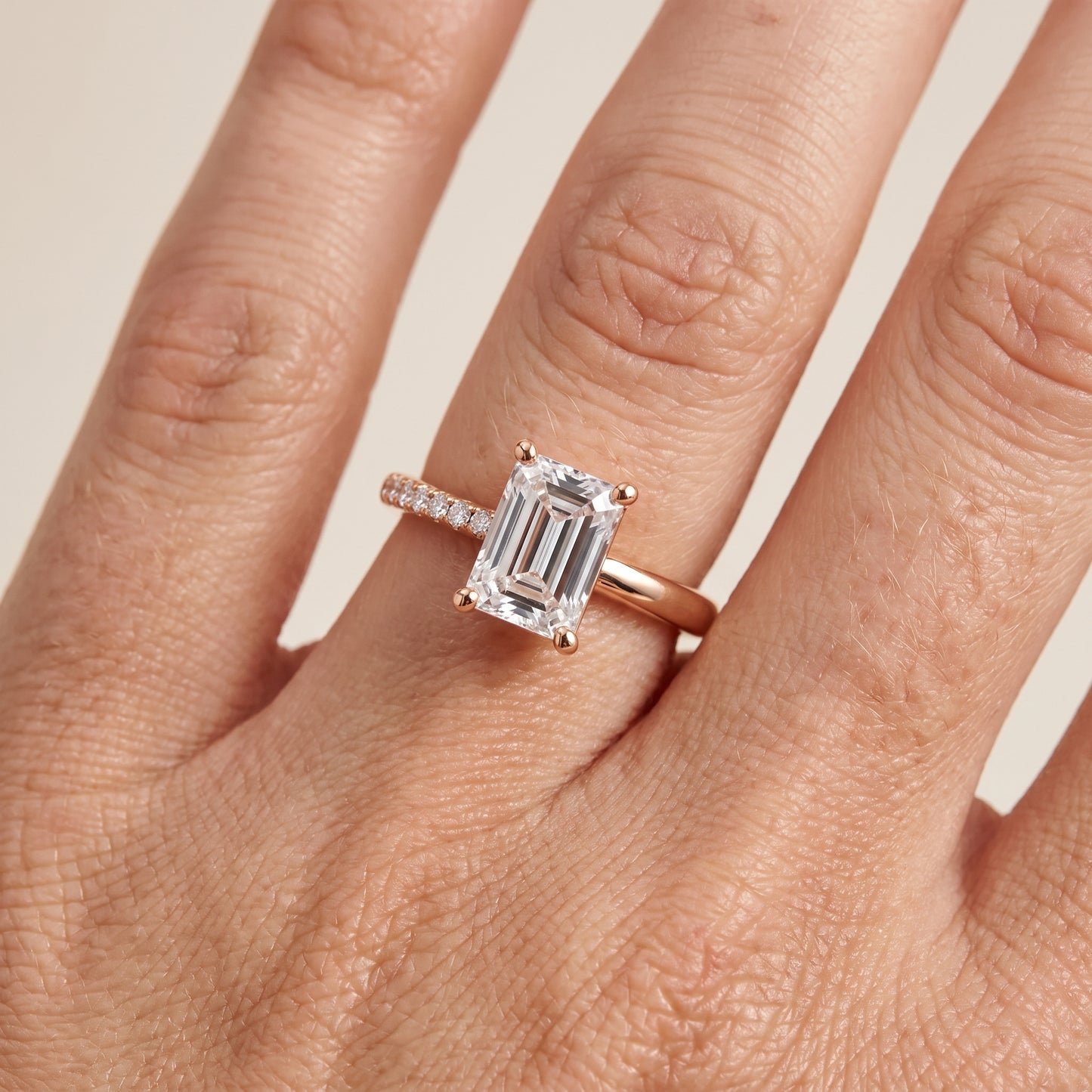 Rosie Solitaire Basket Emerald Diamond Engagement Ring in Rose Gold - lifestyle.jpg