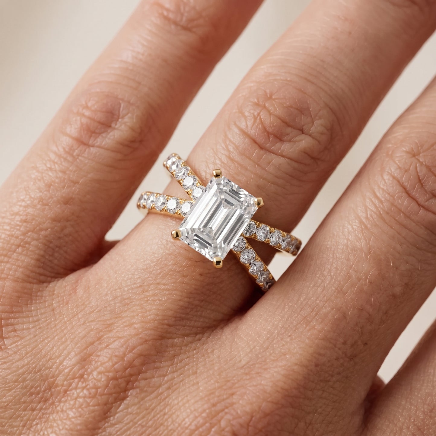 Lior Criss Cross Pavé Emerald Diamond Engagement Ring in Yellow Gold - lifestyle.jpg