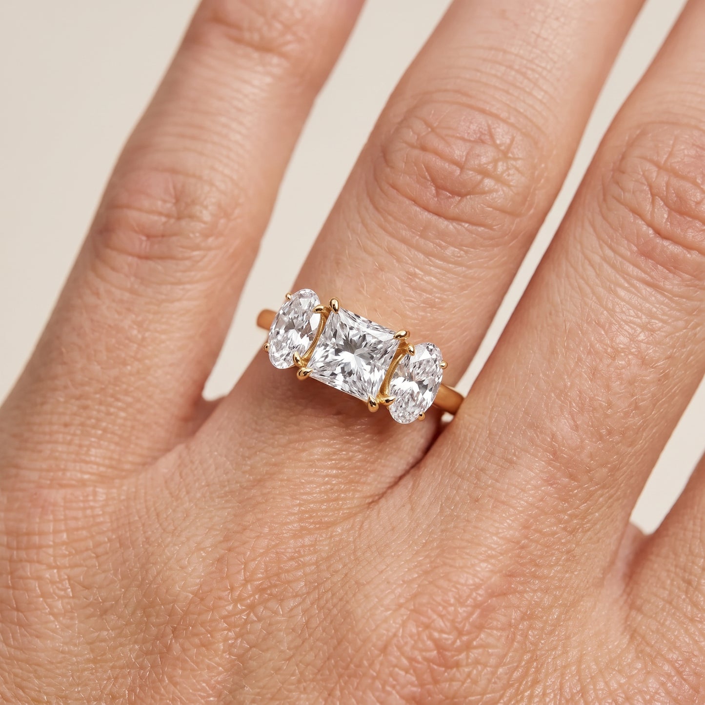 Lila Three-Stone Princess Diamond Ring in Yellow Gold - lifestyle.jpg