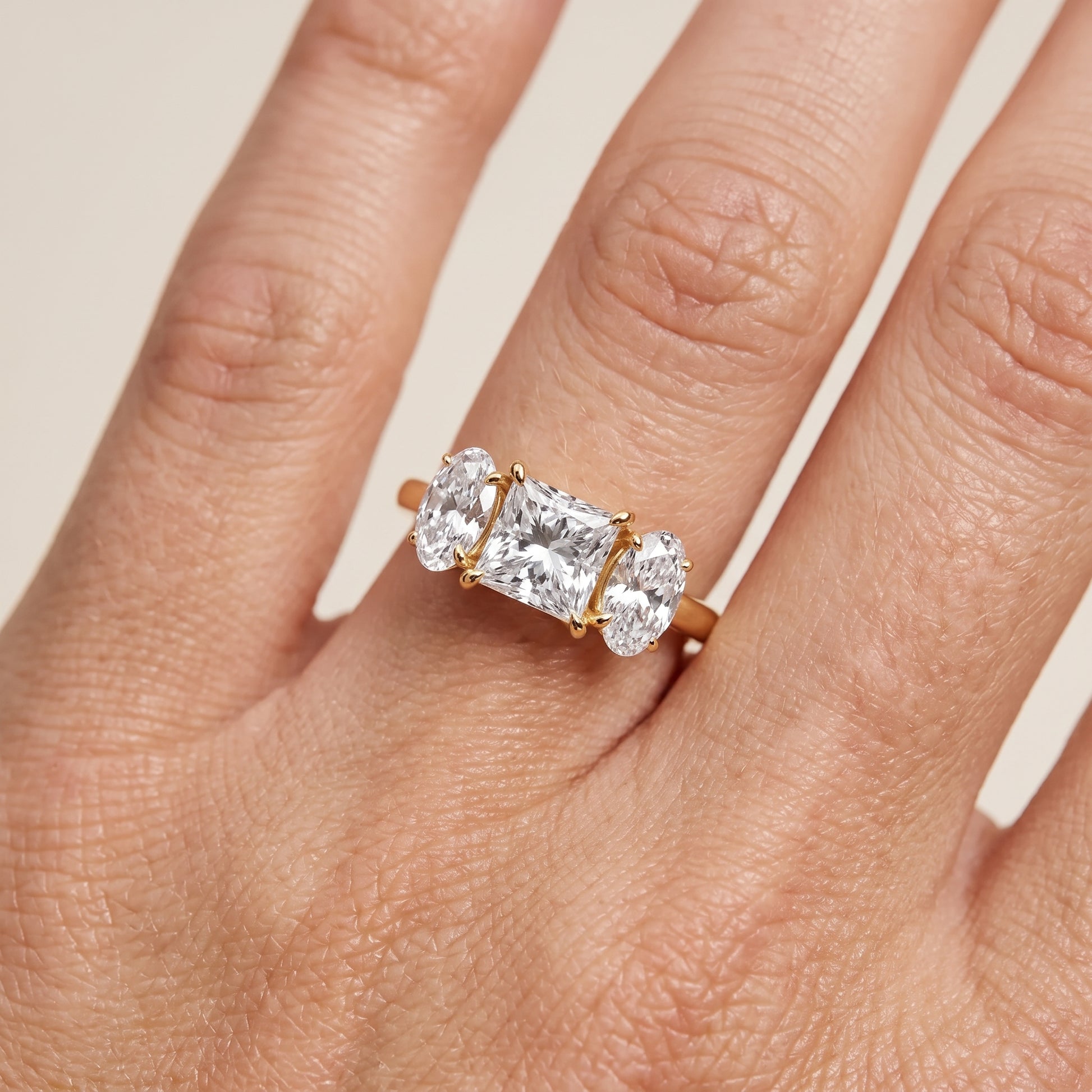 Lila Three-Stone Princess Diamond Ring in Yellow Gold - lifestyle.jpg