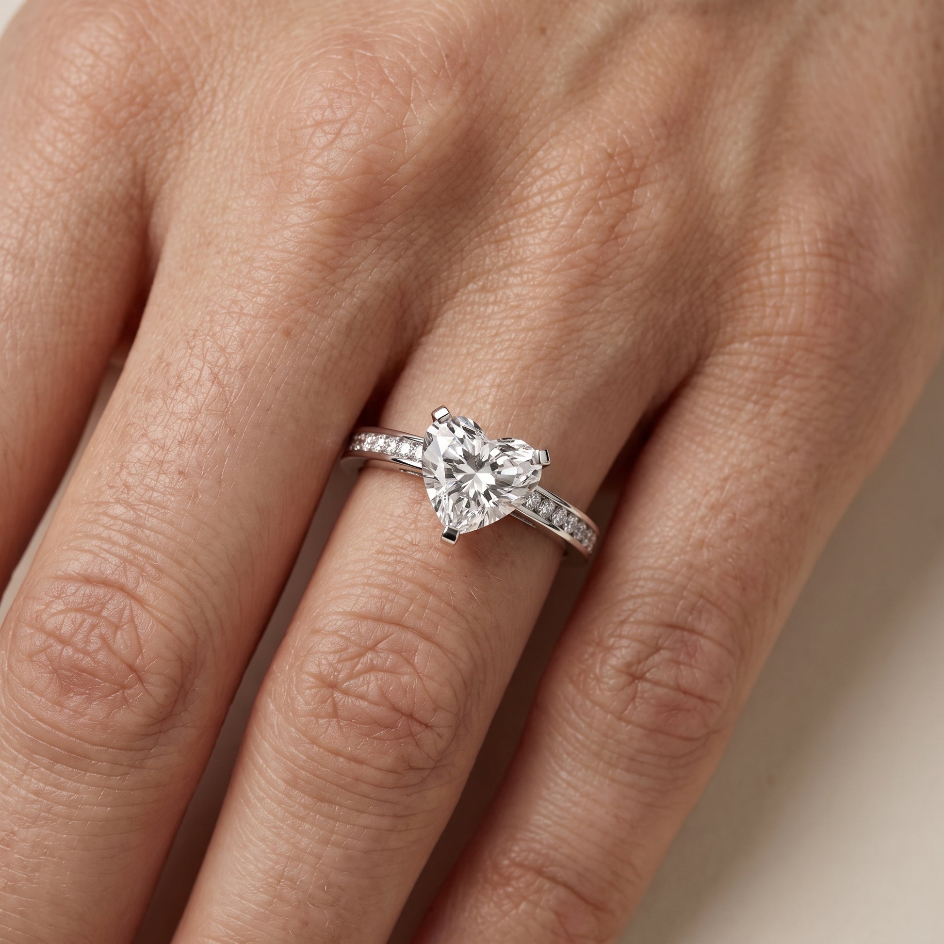 Tessa Solitaire Channel Set Heart Diamond Engagement Ring in Platinum - lifestyle.jpg