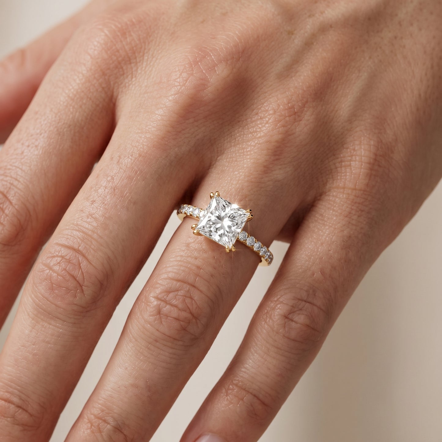 Novara Solitaire Pavé Princess Diamond Ring in Yellow Gold - lifestyle.jpg