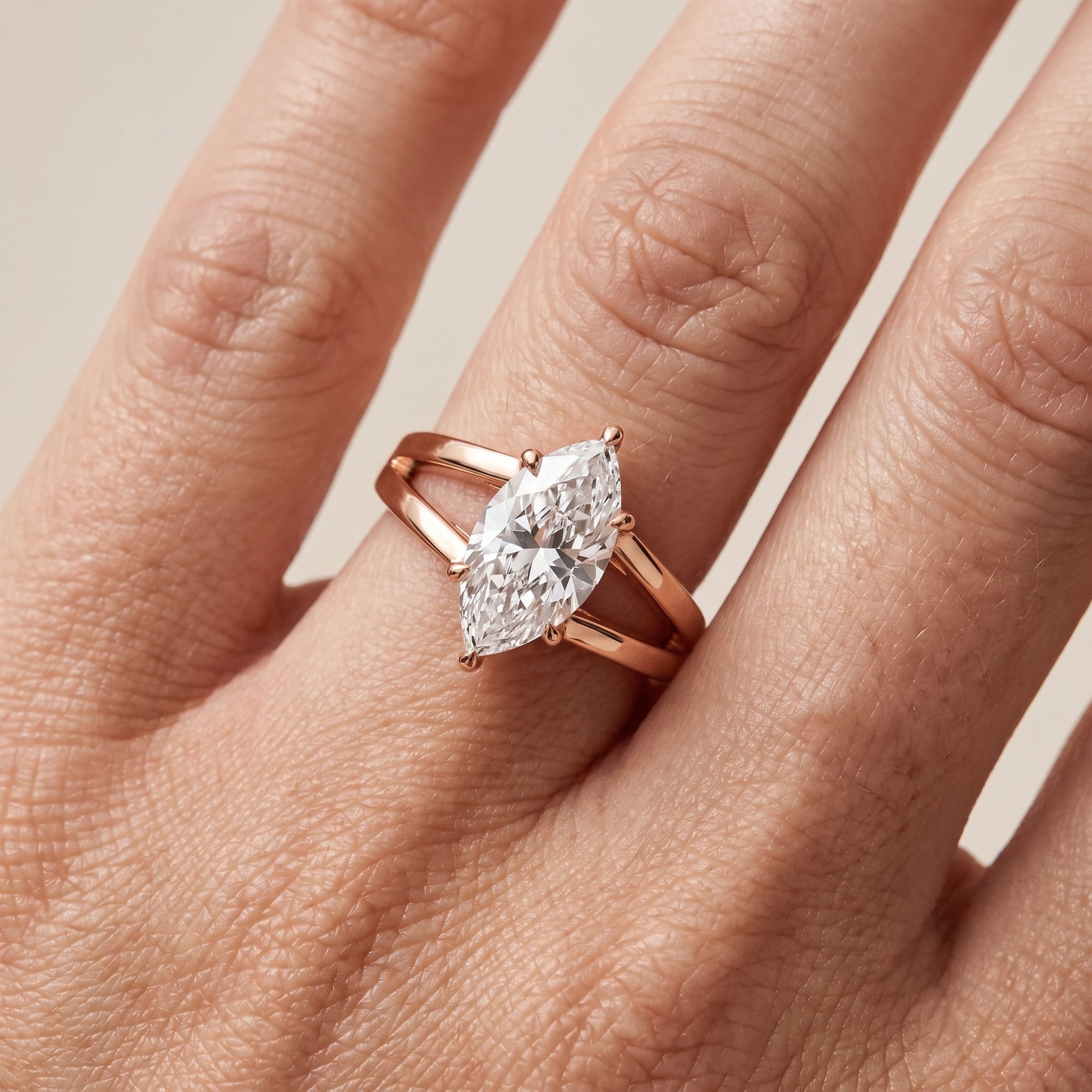Giselle Solitaire Split Shank Marquise Diamond Engagement Ring in Rose Gold - lifestyle.jpg