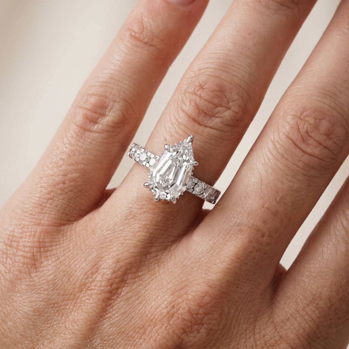 Delaney Hidden Halo French Pavé Step Cut Pear Diamond Engagement Ring in White Gold - lifestyle.jpg