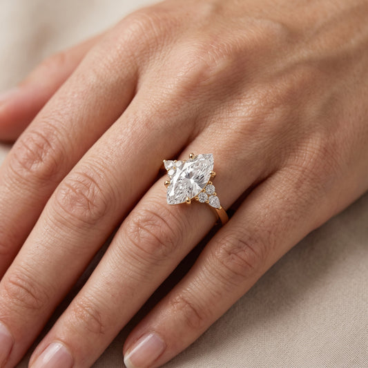 Amelia Three Stone Marquise Diamond Engagement Ring in Yellow Gold - lifestyle.jpg