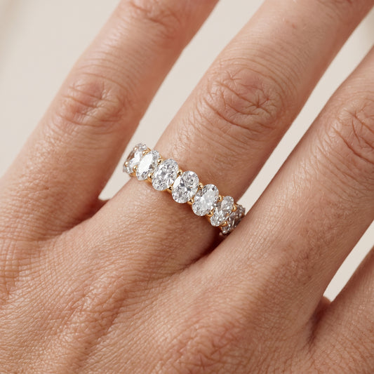 Ivana Shared Prong Oval Diamond Eternity Band in Yellow Gold - lifestyle.jpg