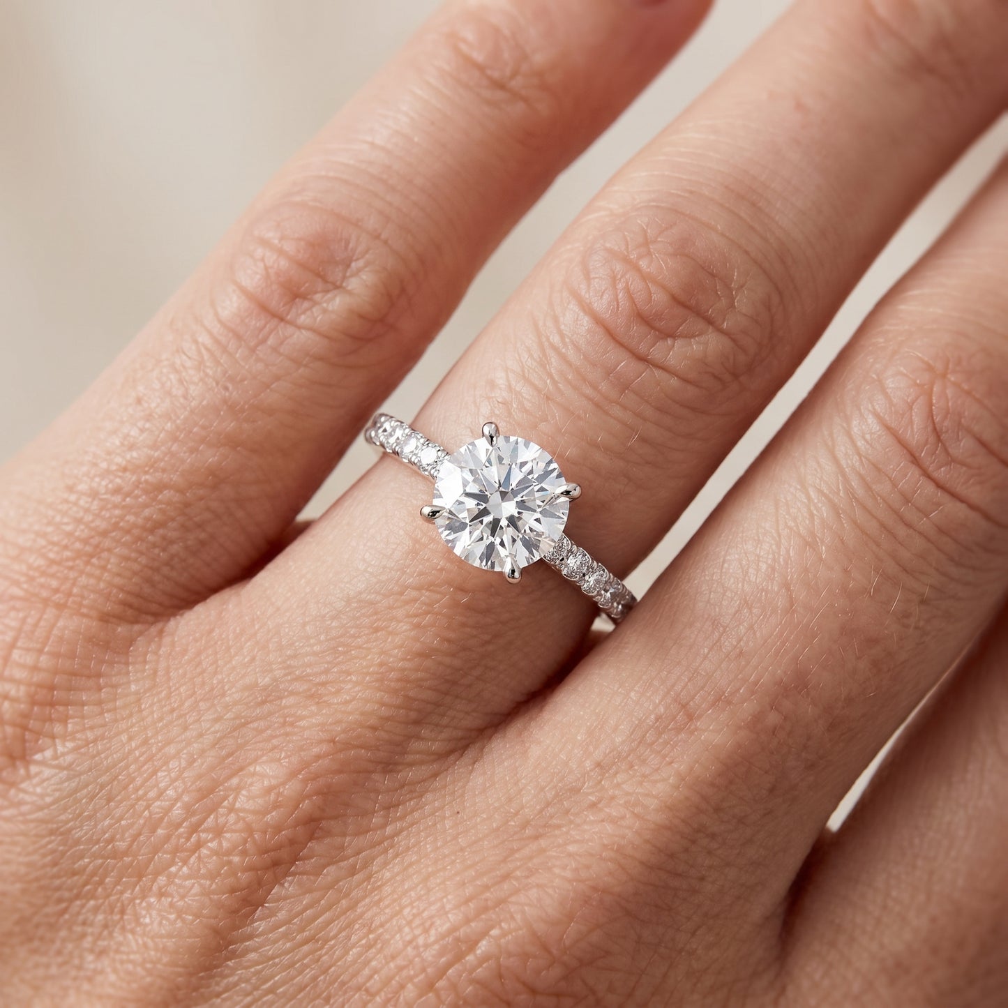 Novara Solitaire Pavé Round Diamond Ring in White Gold - lifestyle.jpg