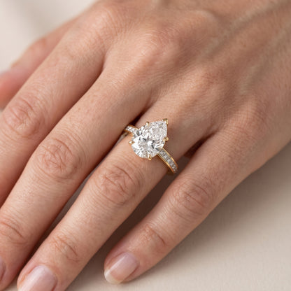 Freja Channel Set Pear Diamond Engagement Ring in Yellow Gold - lifestyle.jpg