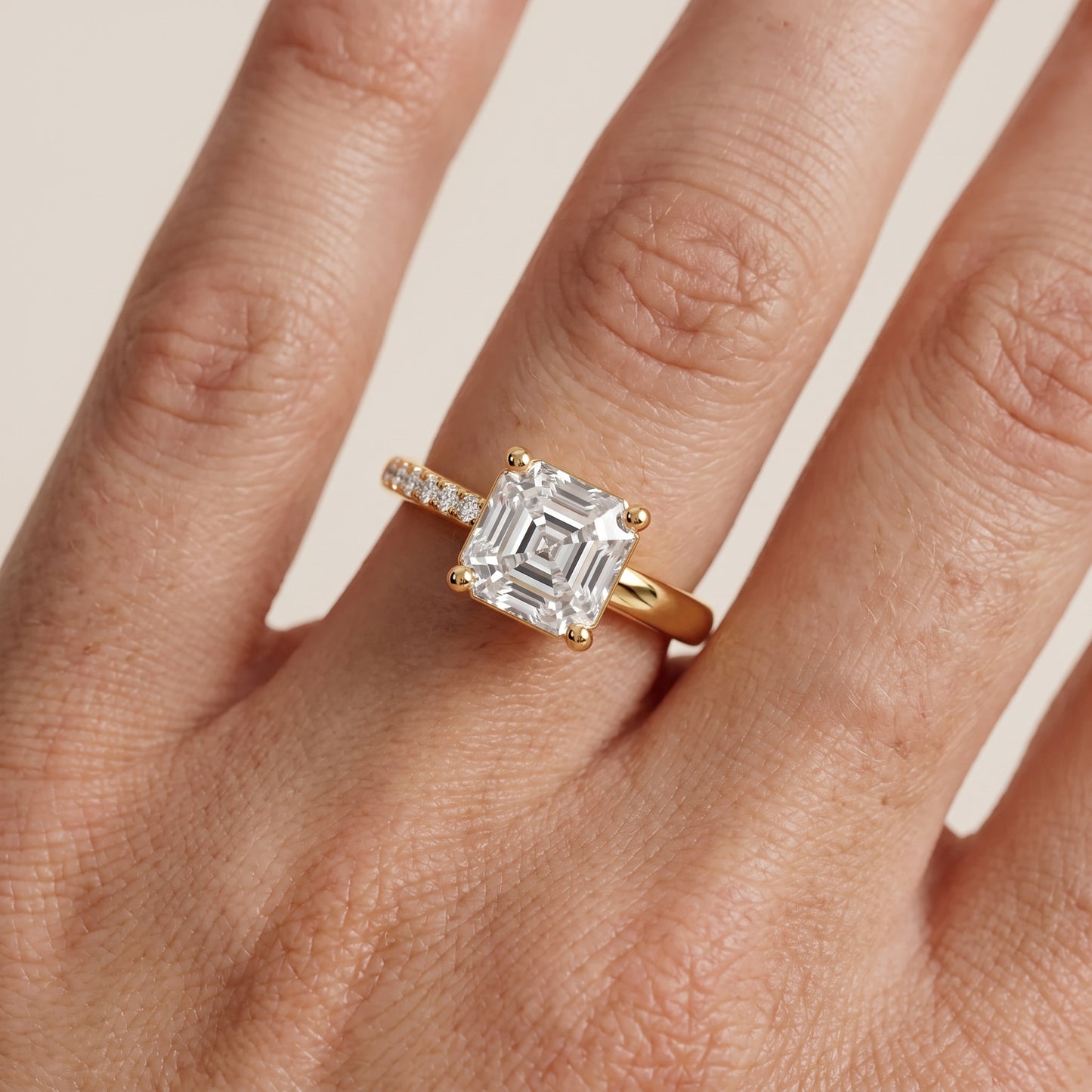 Rosie Solitaire Basket Asscher Diamond Engagement Ring in Yellow Gold - lifestyle.jpg