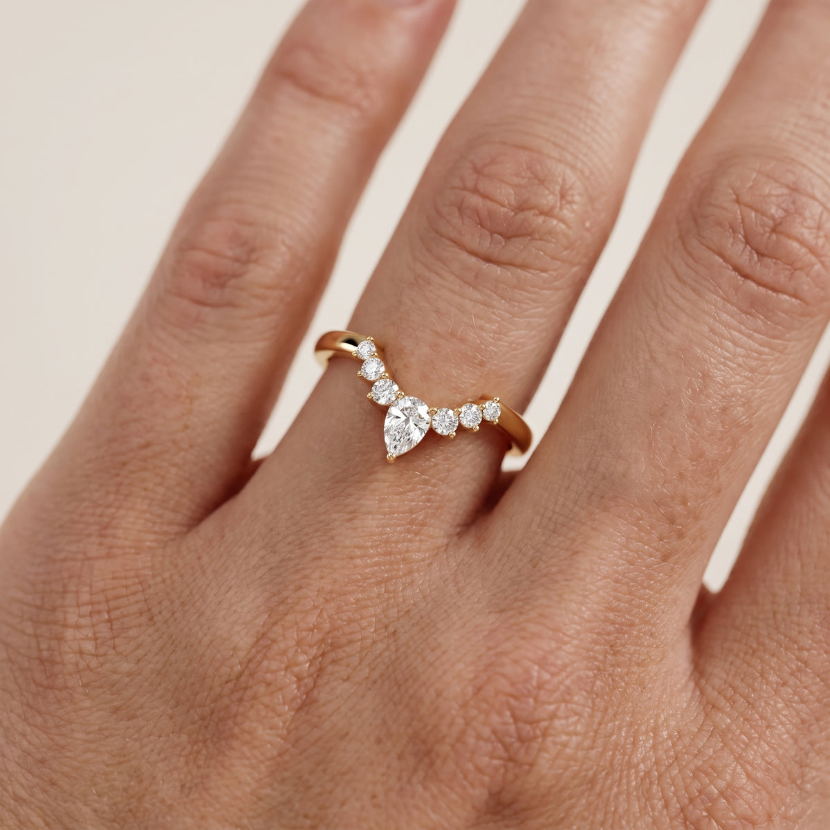 Nisha Curved Pear & Round Diamond Wedding Band in Yellow Gold - lifestyle.jpg