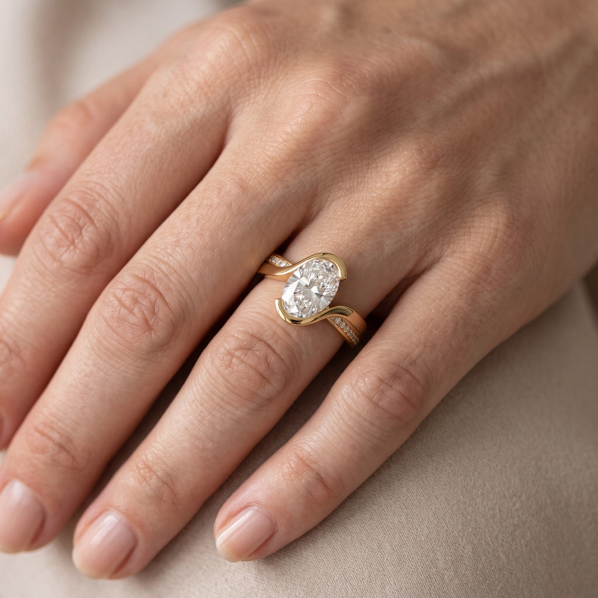 Solene Half Bezel Bypass Oval Diamond Engagement Ring in White Gold - lifestyle.jpg