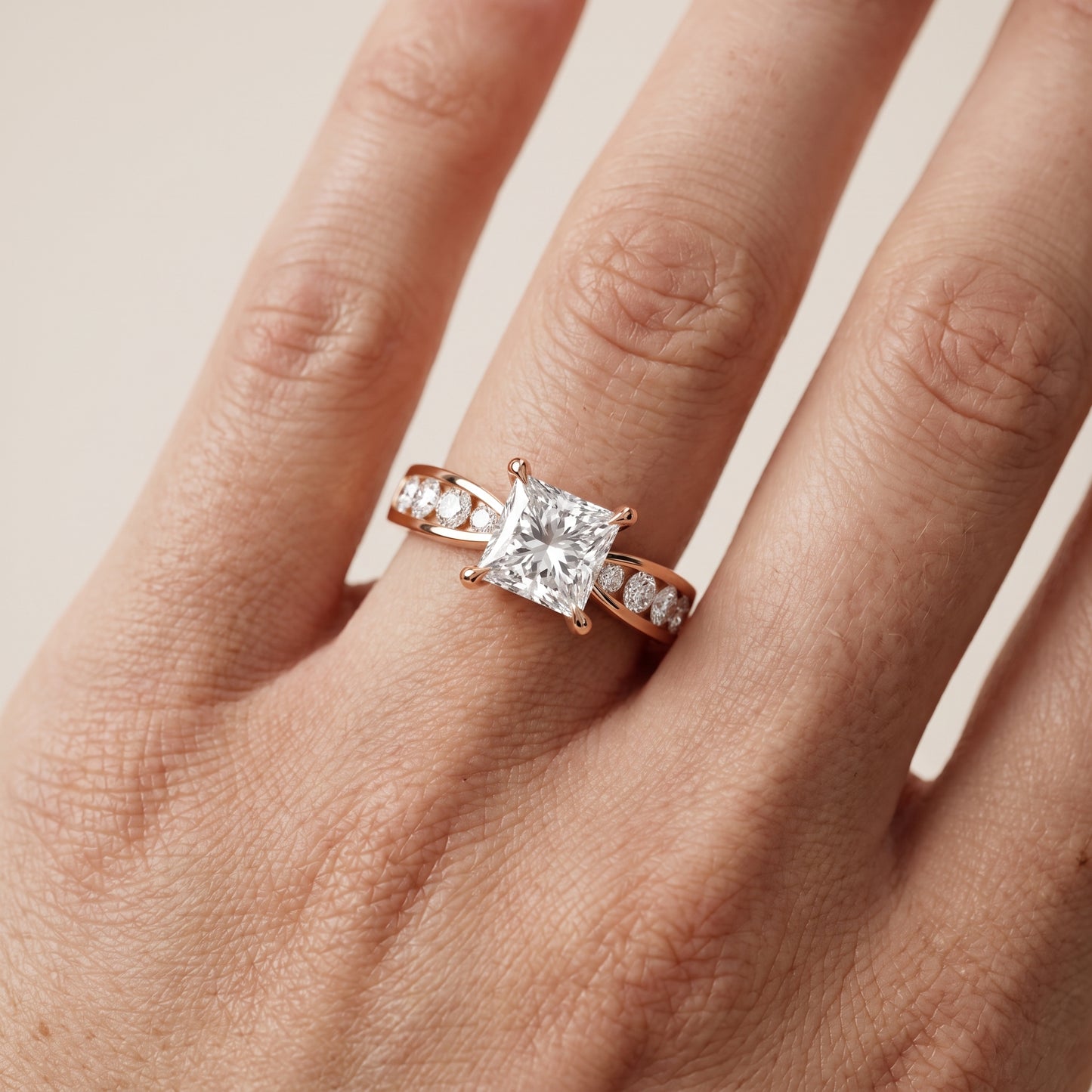 Noor Channel Set Sidestone Princess Diamond Engagement Ring in Rose Gold - lifestyle.jpg