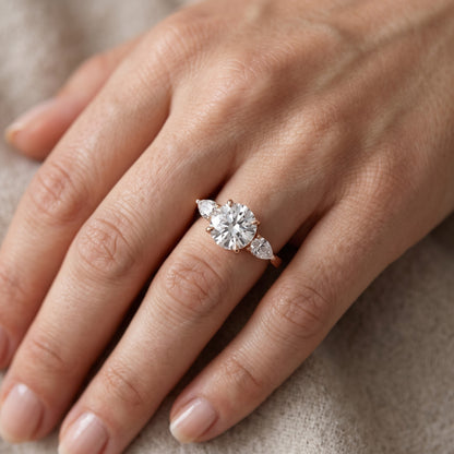 Grace Three Stone Round Diamond Engagement Ring in Rose Gold - lifestyle.jpg