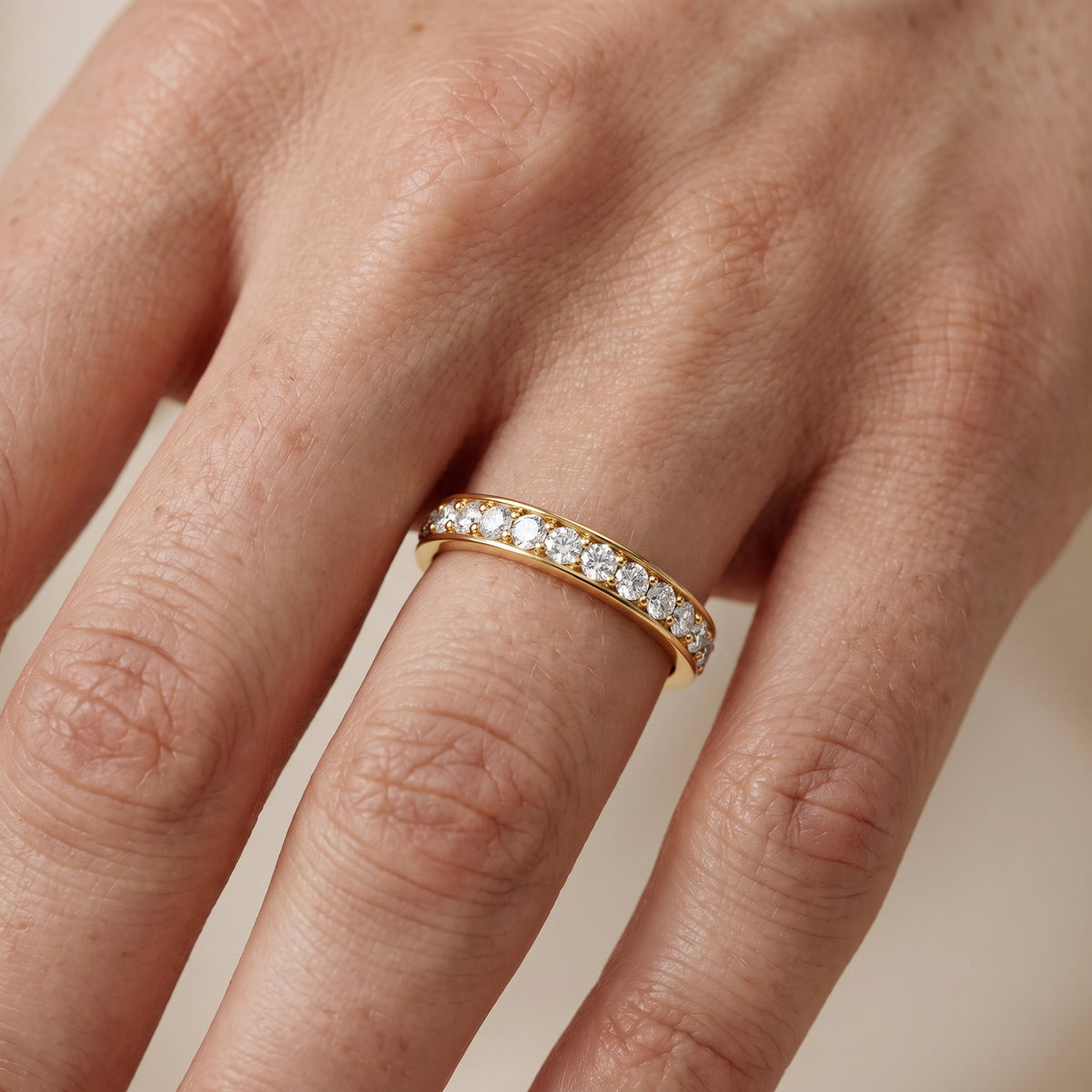 Juniper Classic Pavé Round Diamond Eternity Band in Yellow Gold - lifestyle.jpg