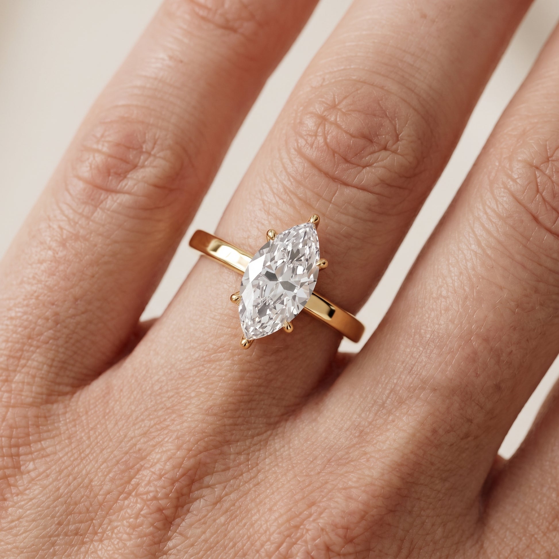 Kaia Solitaire Marquise Diamond Ring in Yellow Gold - lifestyle.jpg