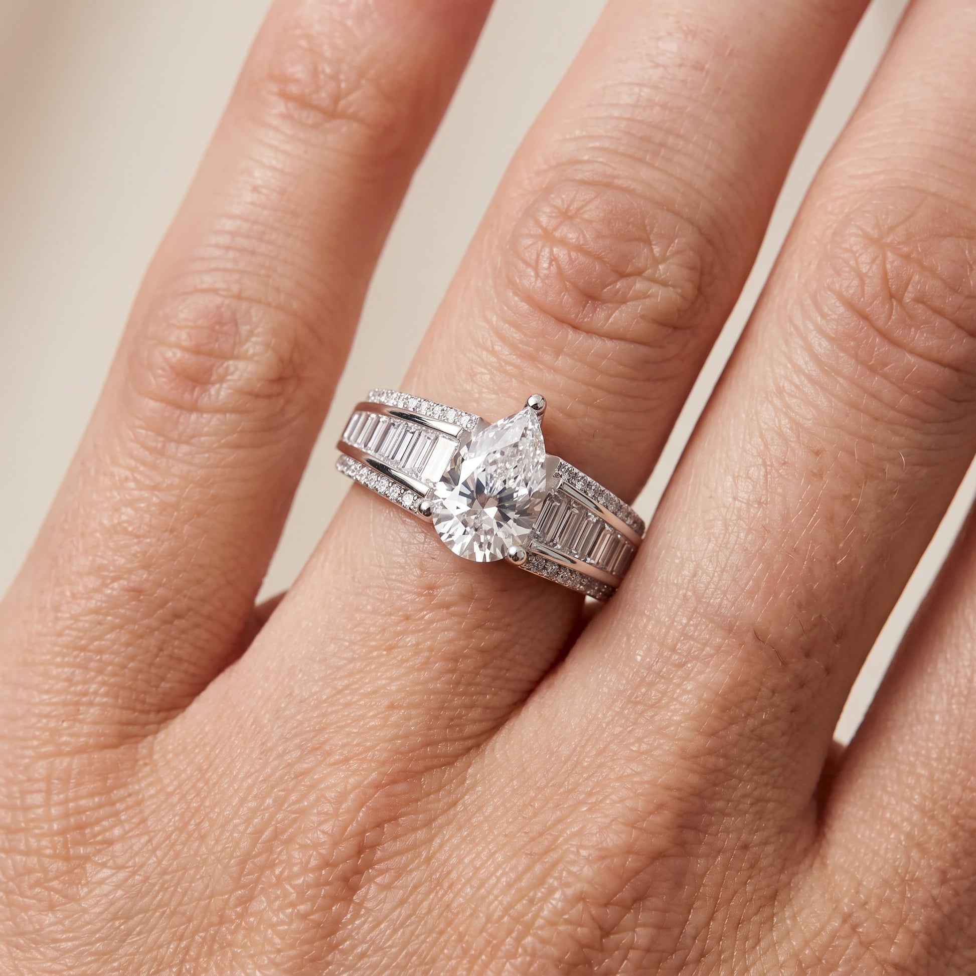 Halle Channel Set Baguette Accent Pear Diamond Engagement Ring in White Gold - lifestyle.jpg