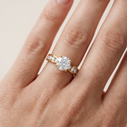 Noor Channel Set Sidestone Round Diamond Engagement Ring in Yellow Gold - lifestyle.jpg