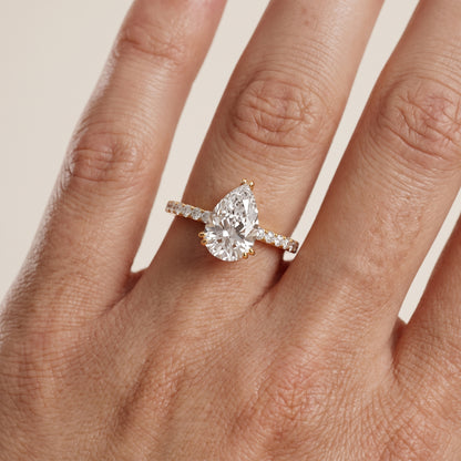 Novara Solitaire Pavé Pear Diamond Ring in Yellow Gold - lifestyle.jpg