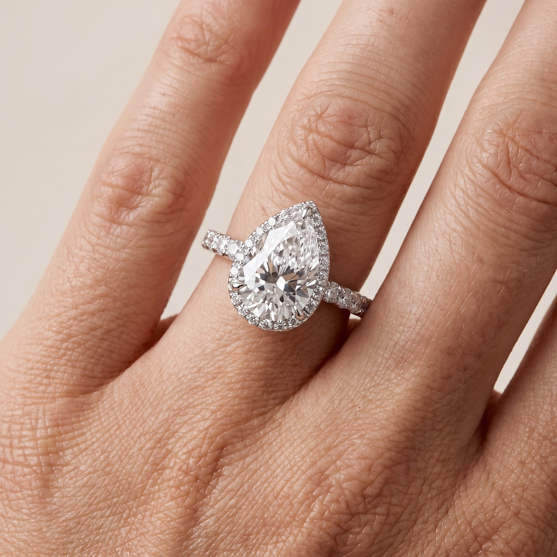 Chloe Halo Pavé Pear Diamond Ring in White Gold - lifestyle.jpg