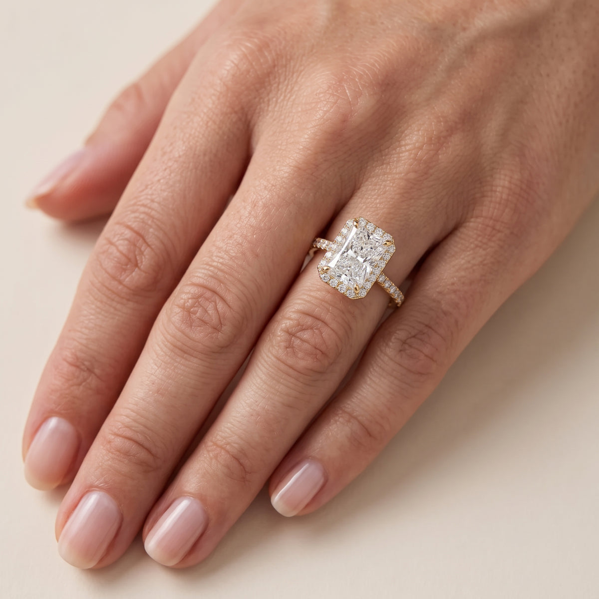 Willa Halo Micropavé Radiant Diamond Engagement Ring in Yellow Gold - lifestyle.jpg