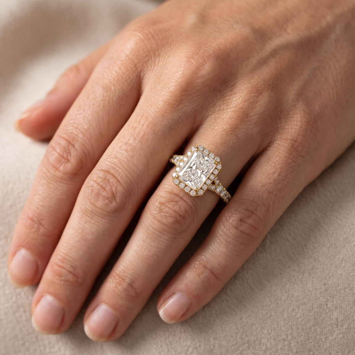 Bella Halo Pavé Radiant Diamond Engagement Ring in Yellow Gold - lifestyle.jpg