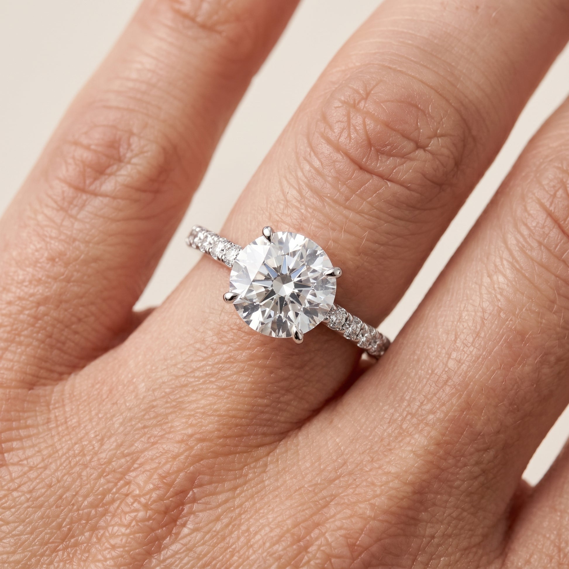 Juna French Pavé Solitaire Round Diamond Engagement Ring in Platinum - lifestyle.jpg