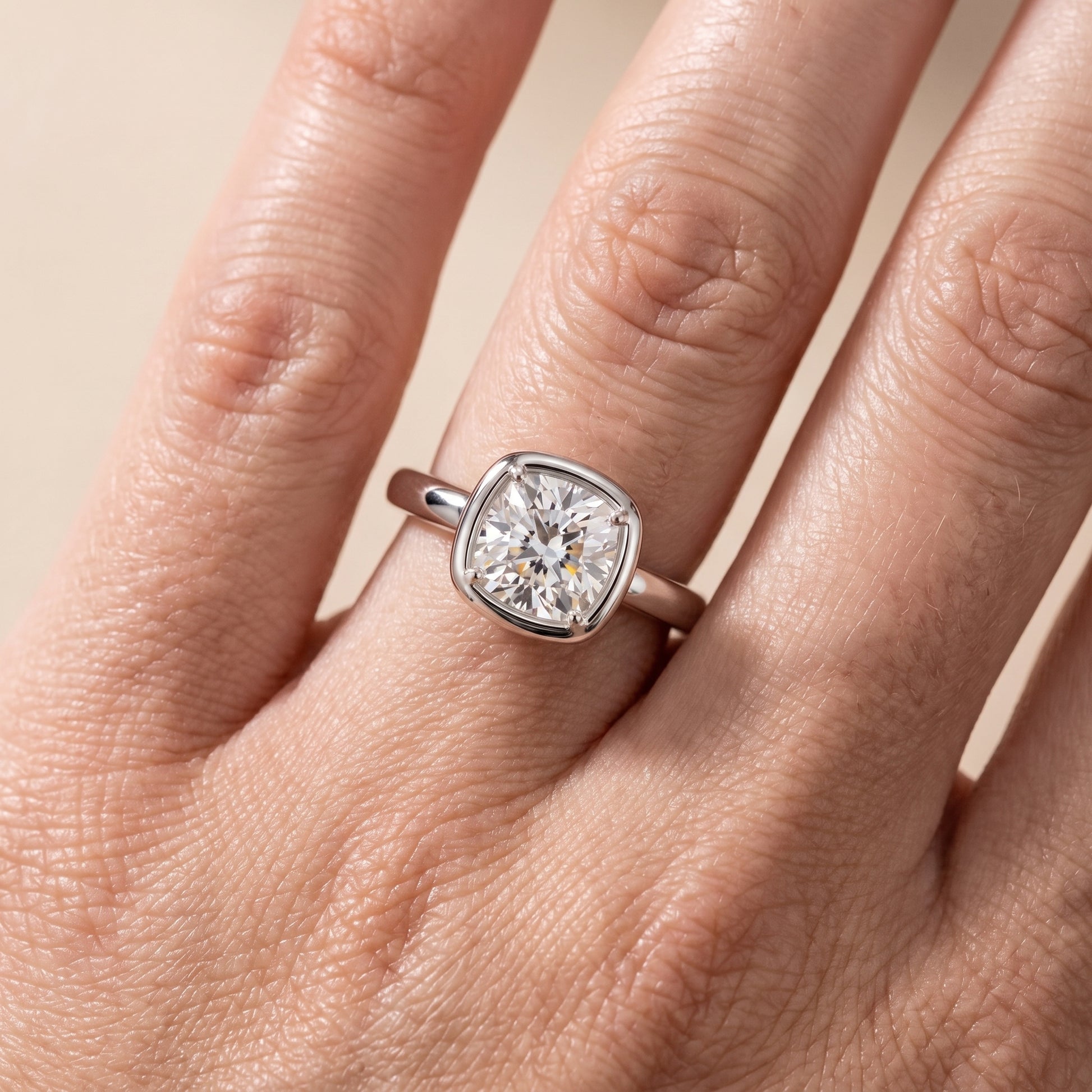 Alina Bezel Solitaire Cushion Diamond Ring in Platinum - lifestyle.jpg