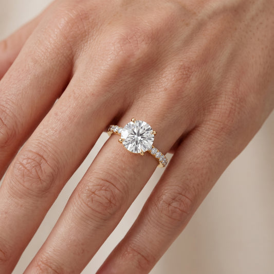 Thea Hidden Halo Pavé Round Diamond Engagement Ring in Yellow Gold - lifestyle.jpg