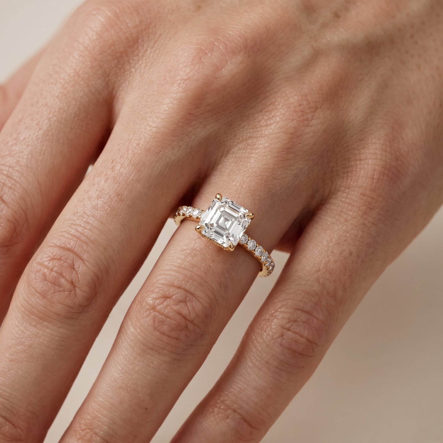 Thea Hidden Halo Pavé Asscher Diamond Engagement Ring in Yellow Gold - lifestyle.jpg