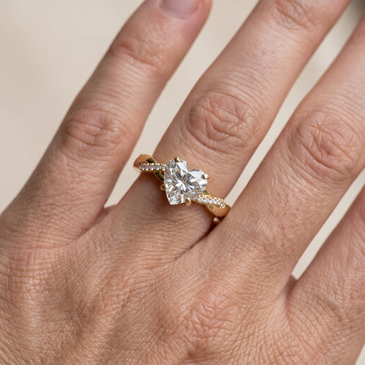 Twisted Side Stone Heart Diamond Engagement Ring in Yellow Gold - lifestyle.jpg