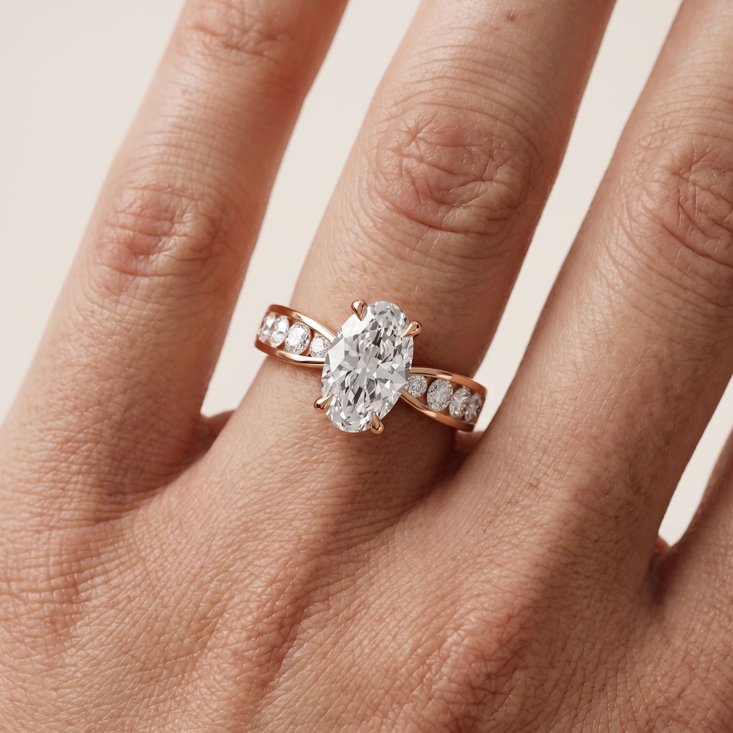 Noor Channel Set Sidestone Oval Diamond Engagement Ring in Rose Gold - lifestyle.jpg