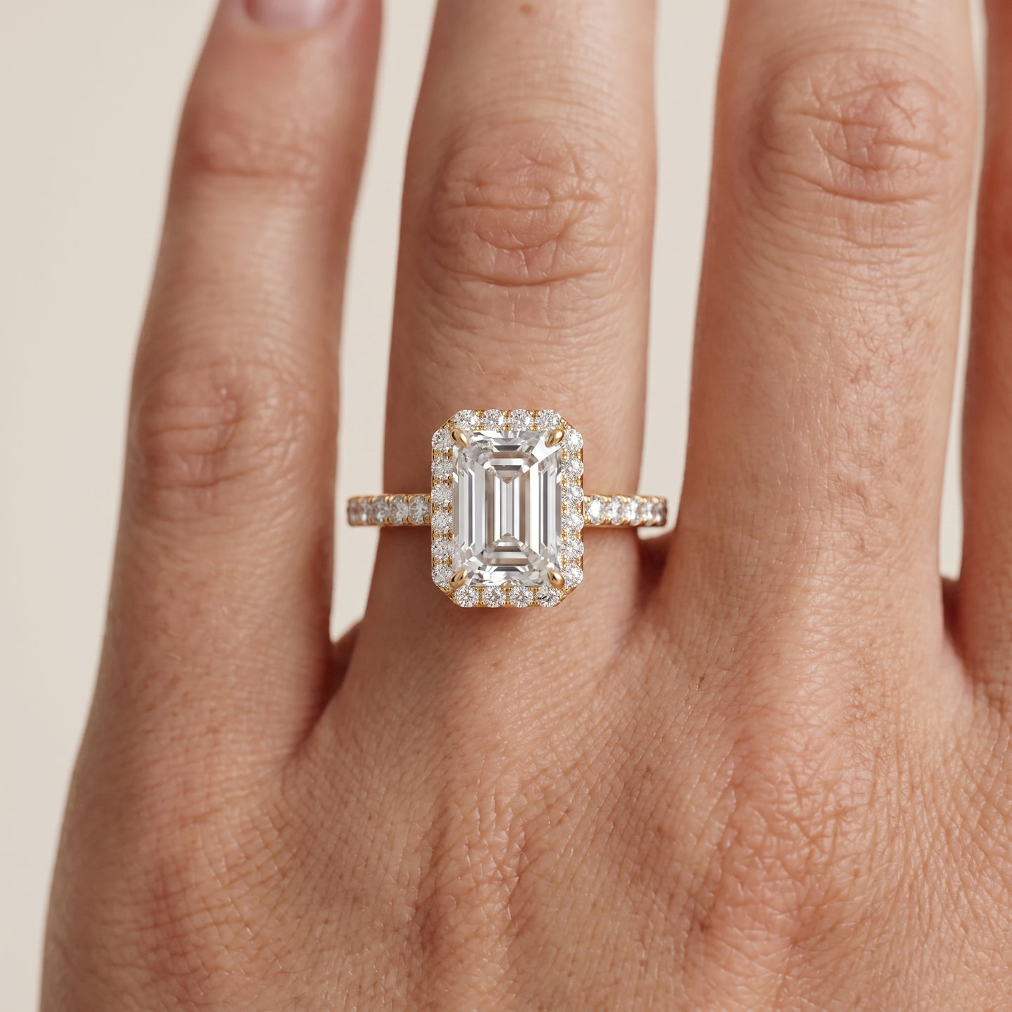 Willa Halo Micropavé Emerald Diamond Engagement Ring in Yellow Gold - lifestyle.jpg