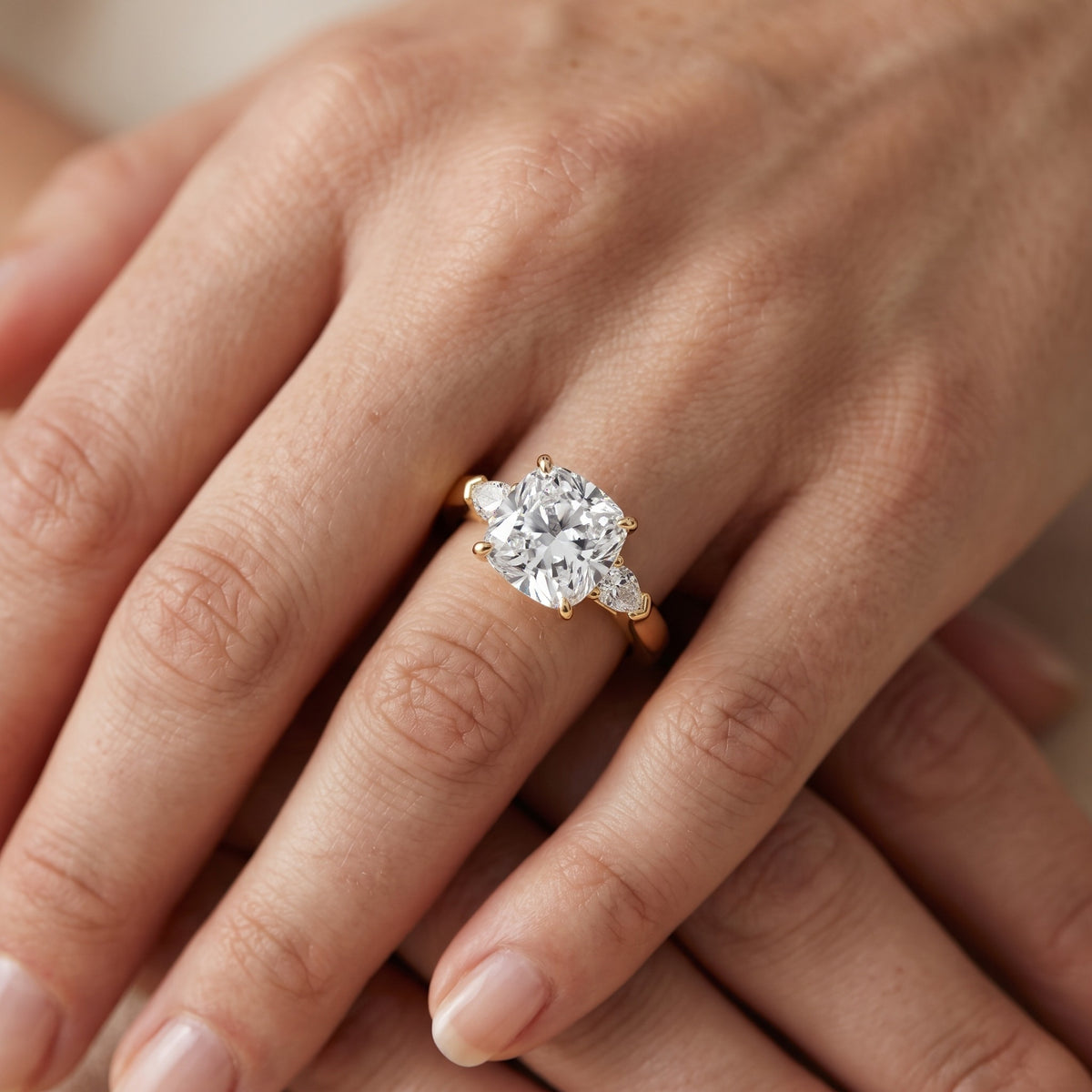 Dahlia Three-Stone Cathedral Cushion Diamond Engagement Ring in White Gold - lifestyle.jpg
